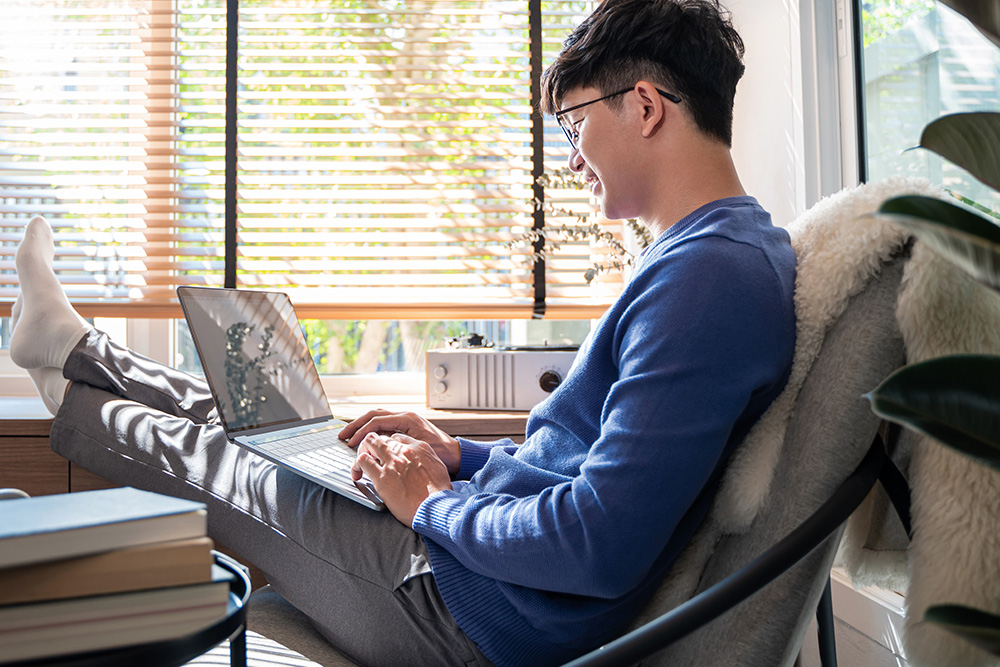 Mental health professionals can access our neurodiversity-affirming resource page to learn more about neurodivergent adults, autistic women, autistic trauma, etc. Neurodivergent therapist on a laptop exploring the Neurodiversity Training Center resource library.